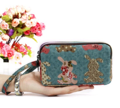 New portable female hand grasping bag three-layer zipper bag autumn long large screen mobile phone key ladies coin purse Hanzuva