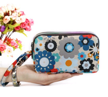 New portable female hand grasping bag three-layer zipper bag autumn long large screen mobile phone key ladies coin purse Hanzuva