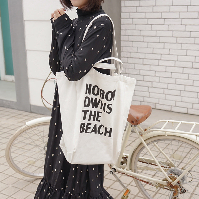 Simple letter single shoulder canvas bag female student Hanzuva