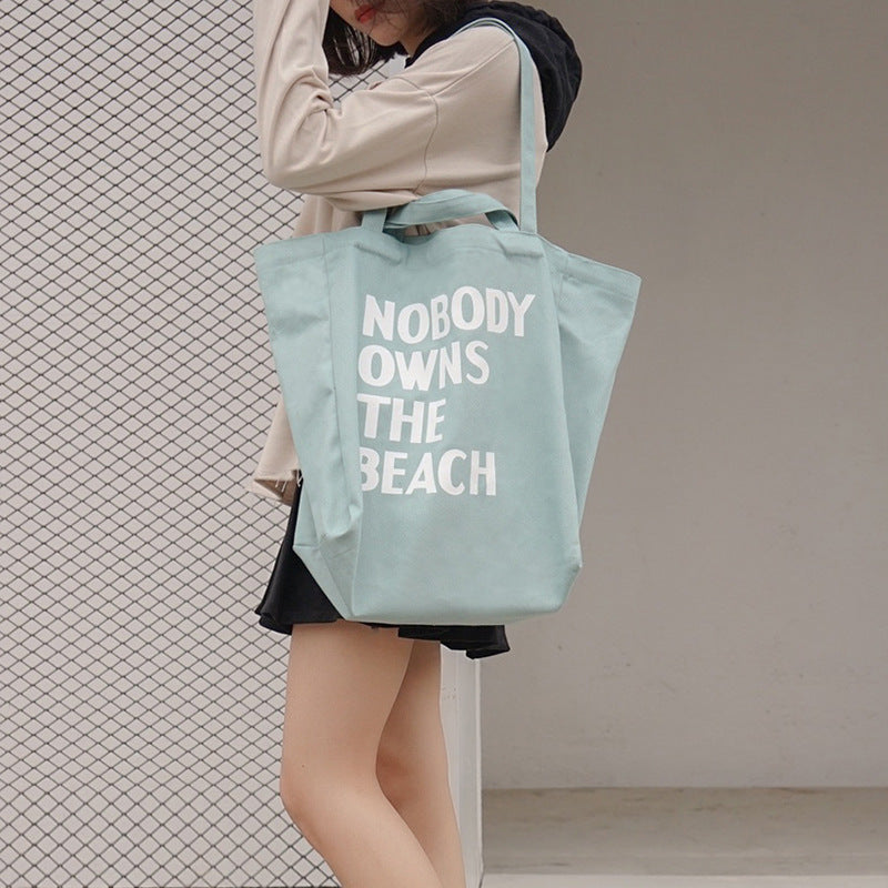 Simple letter single shoulder canvas bag female student Hanzuva