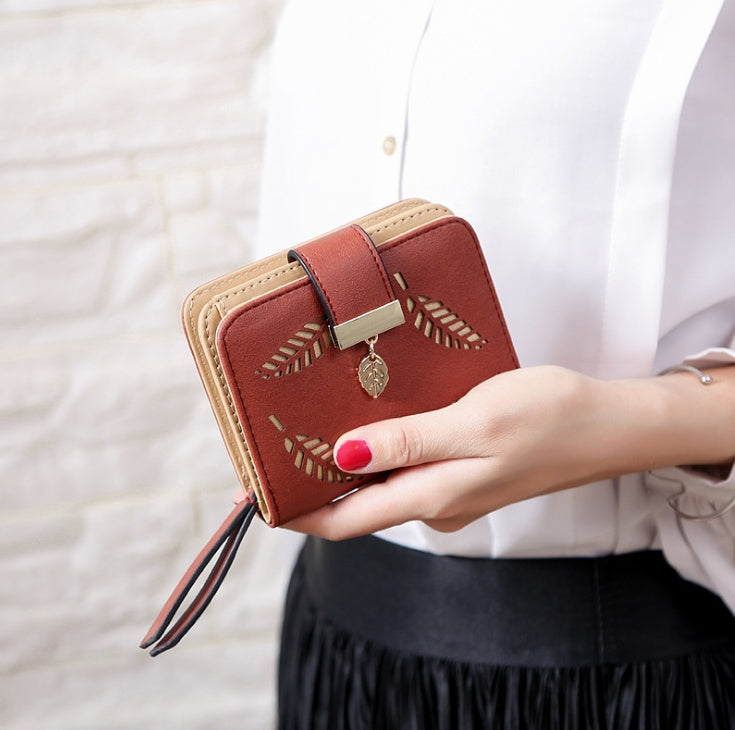 New Korean Women's Wallet Short Hollow Clutch Bag Leaf Zipper Buckle Bills Card Pack Hanzuva