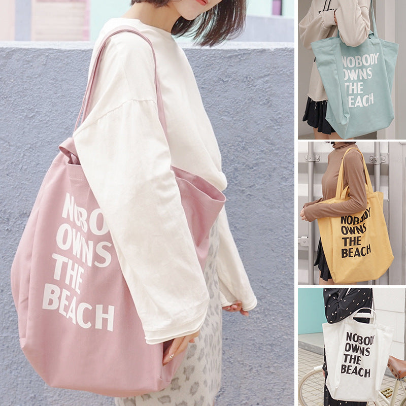 Simple letter single shoulder canvas bag female student Hanzuva