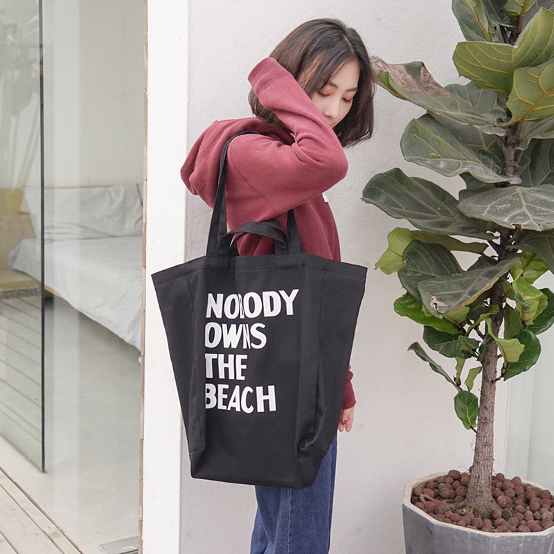 Simple letter single shoulder canvas bag female student Hanzuva