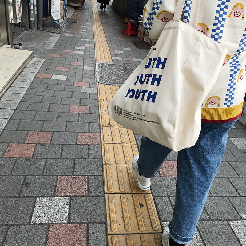 Letter print canvas shoulder bag Hanzuva