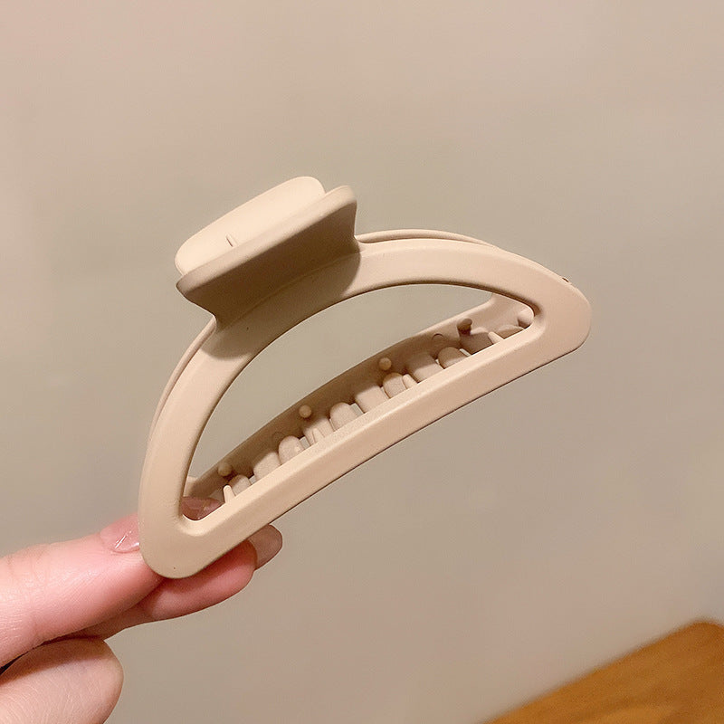 Take A Bath Plate, Hair Clip, The Back Of The Woman's Head